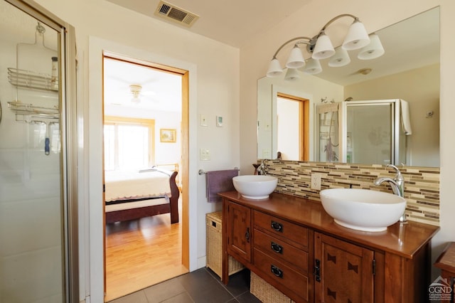 53 Snyder Pond Rd, Copake, NY 12516 - full bath featuring backsplash, tile patterned flooring, a stall shower, connected bathroom, and double vanity