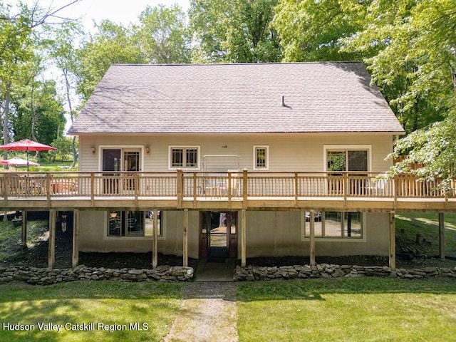 53 Snyder Pond Rd, Copake, NY 12516 - rear view of house with a deck, a lawn, and roof with shingles