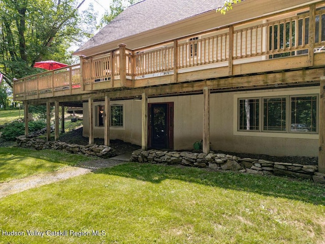 53 Snyder Pond Rd, Copake, NY 12516 - rear view of house with a deck, a yard, and a shingled roof