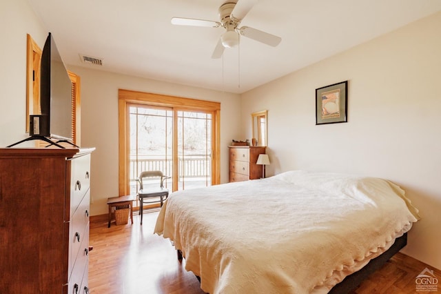 53 Snyder Pond Rd, Copake, NY 12516 - bedroom featuring access to outside, wood finished floors, and ceiling fan