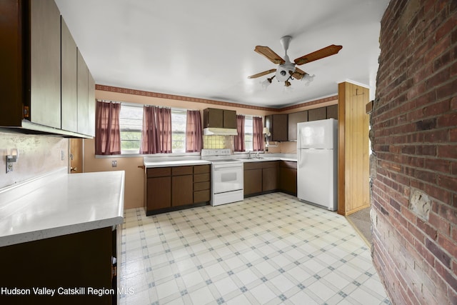 118 Yonderview Rd, Hillsdale, NY 12529 - kitchen with white appliances, light flooring, light countertops, ceiling fan, and brick wall