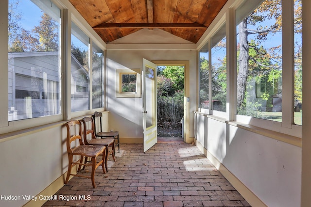 16-26 Shultis Brook Rd, Bearsville, NY 12409 - unfurnished sunroom featuring wooden ceiling, lofted ceiling, and brick floors