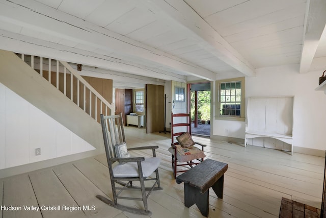 16-26 Shultis Brook Rd, Bearsville, NY 12409 - living room with light wood-style flooring, stairway, and a wood ceiling with exposed beams