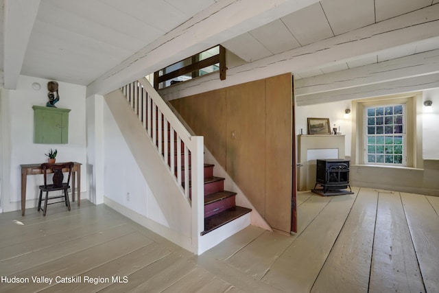 16-26 Shultis Brook Rd, Bearsville, NY 12409 - stairway with a wood stove and hardwood / wood-style floors
