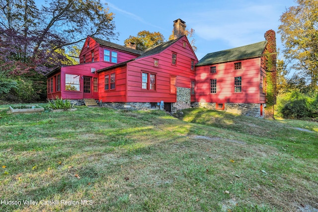 16-26 Shultis Brook Rd, Bearsville, NY 12409 - view of side of property featuring a chimney, a lawn, and entry steps