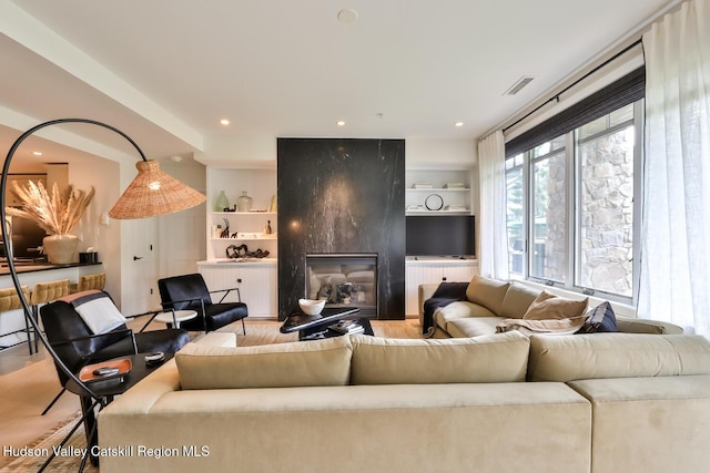 10 Enclave N Dr Unit 106, Windham, NY 12496 - living room with a premium fireplace, recessed lighting, and built in shelves