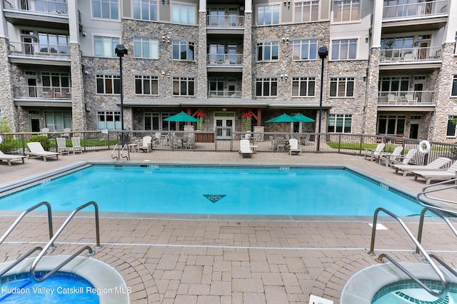 10 Enclave N Dr Unit 106, Windham, NY 12496 - community pool with a patio