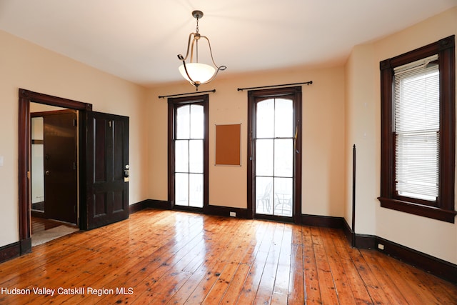 interior space with hardwood / wood-style floors