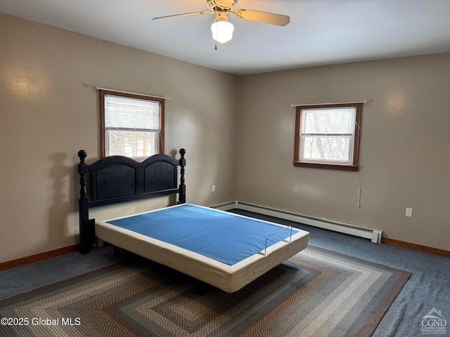 317 Scutt Rd, Greenville, NY 12083 - carpeted bedroom with baseboard heating, multiple windows, baseboards, and a ceiling fan