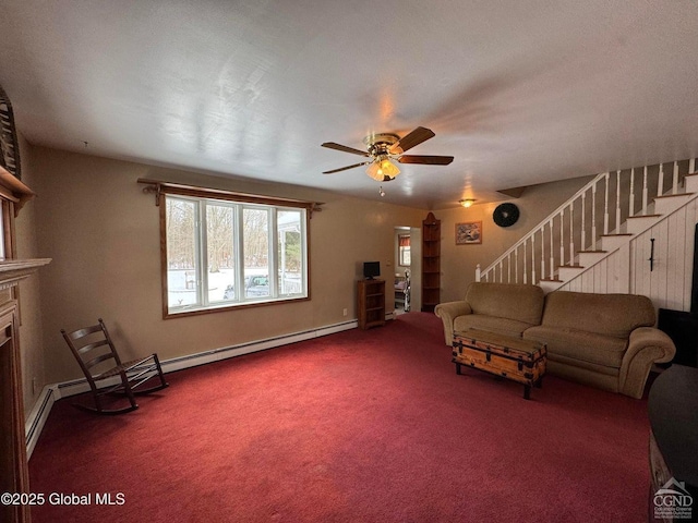 317 Scutt Rd, Greenville, NY 12083 - carpeted living area with stairs, a ceiling fan, a fireplace, a baseboard radiator, and baseboards