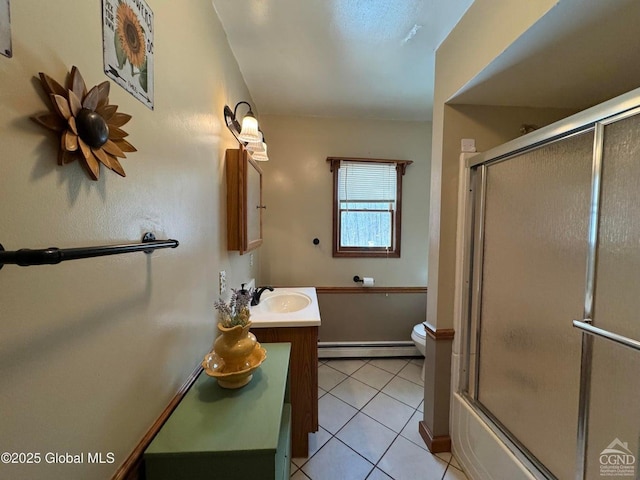 317 Scutt Rd, Greenville, NY 12083 - bathroom featuring a baseboard radiator, toilet, vanity, tile patterned floors, and combined bath / shower with glass door