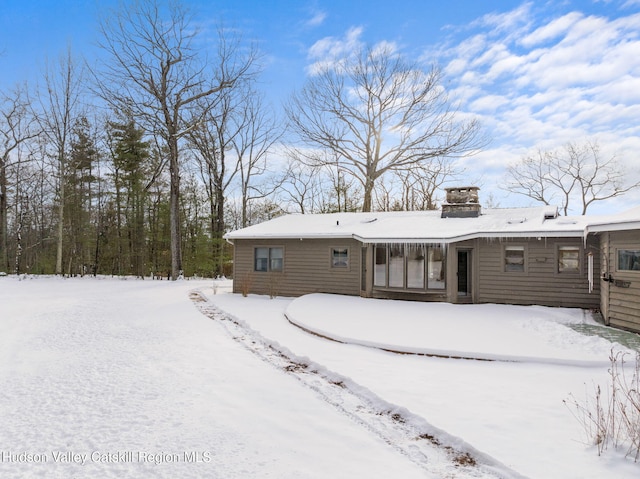 view of snow covered property