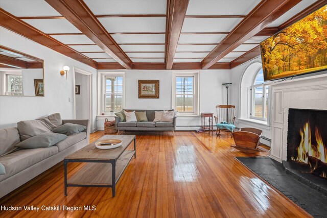 5868 Rte 209, Rochester, NY 12446 - living area featuring a fireplace with flush hearth, hardwood / wood-style flooring, coffered ceiling, beam ceiling, and a baseboard radiator