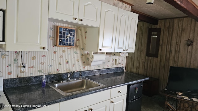 192 W Shore Dr, Valatie, NY 12184 - kitchen with wallpapered walls, white cabinets, dark countertops, and wooden walls