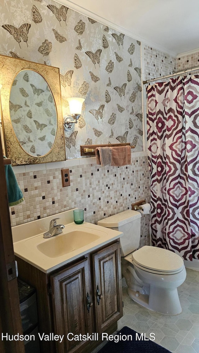192 W Shore Dr, Valatie, NY 12184 - bathroom featuring wallpapered walls, vanity, tile walls, ornamental molding, and a shower with shower curtain