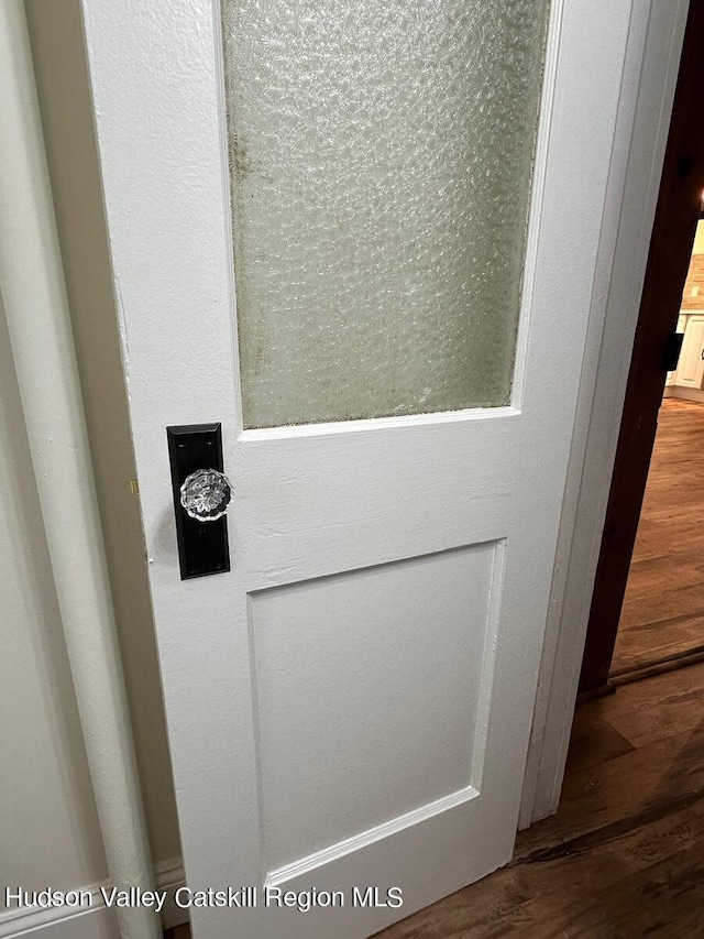 room details featuring hardwood / wood-style floors