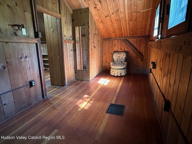 bonus room with dark hardwood / wood-style floors, wood ceiling, lofted ceiling, and wood walls