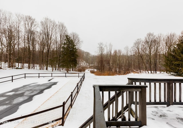 view of snow covered deck