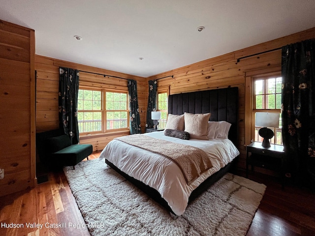 60 Leon Ln, Stony Creek, NY 12878 - bedroom with hardwood / wood-style flooring and wood walls