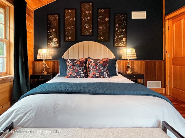 60 Leon Ln, Stony Creek, NY 12878 - bedroom featuring wood walls and wood finished floors