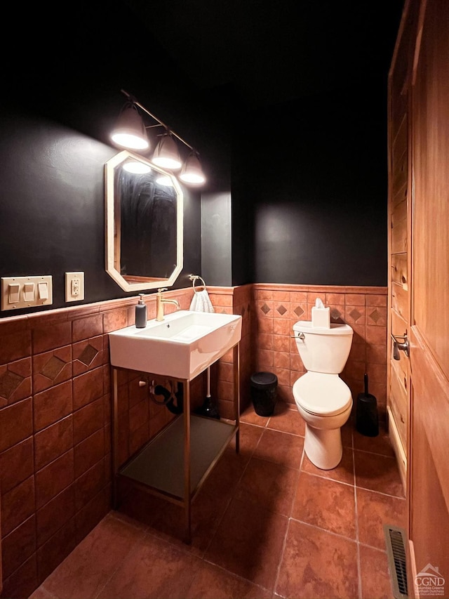 60 Leon Ln, Stony Creek, NY 12878 - bathroom featuring tile walls, a wainscoted wall, and tile patterned flooring