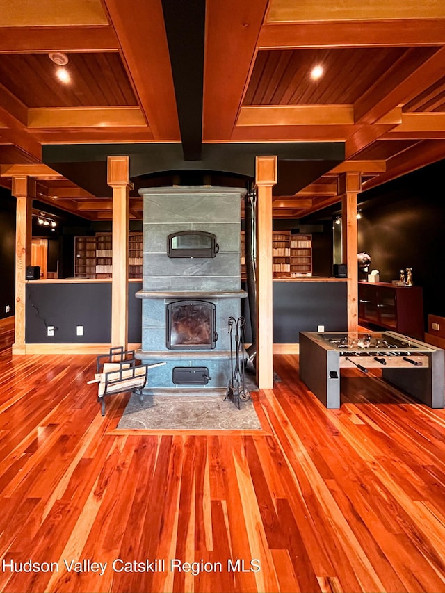 60 Leon Ln, Stony Creek, NY 12878 - living room with wood finished floors, ornate columns, and a wood ceiling with exposed beams