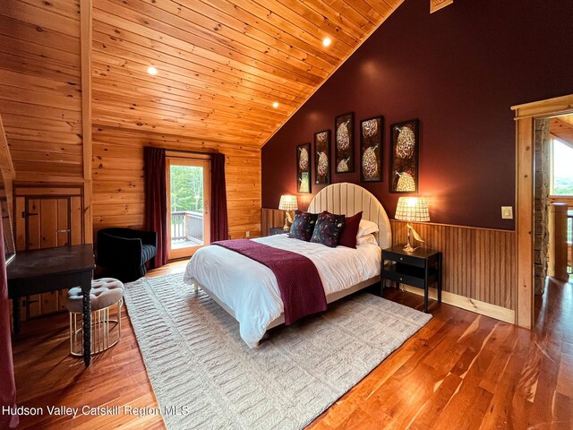 60 Leon Ln, Stony Creek, NY 12878 - bedroom with lofted ceiling, wooden ceiling, access to outside, wooden walls, and a wainscoted wall