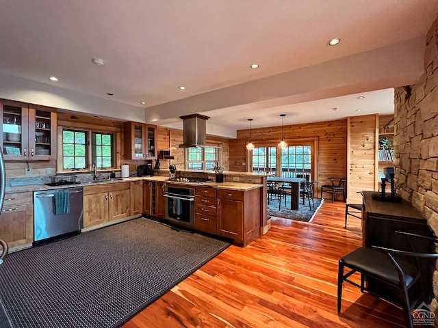 60 Leon Ln, Stony Creek, NY 12878 - kitchen featuring stainless steel appliances, island range hood, a peninsula, light wood-style flooring, and recessed lighting