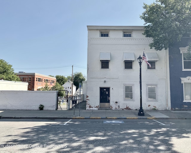 336 Warren St, Hudson, NY 12534 - view of front of home with a gate