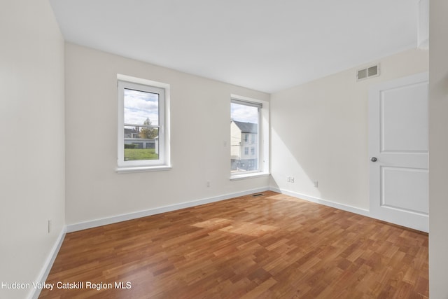 244 Columbia St, Hudson, NY 12534 - unfurnished room with wood finished floors and baseboards
