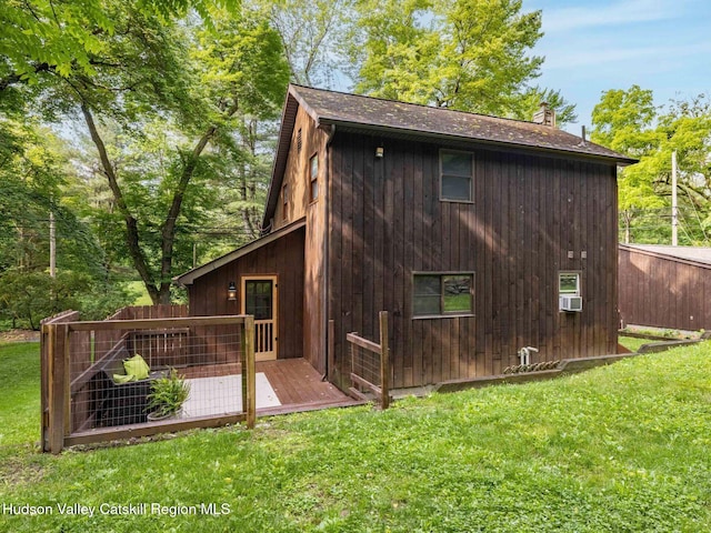 221 Cardinal Rd, Hyde Park, NY 12538 - rear view of property with a shingled roof and a chimney
