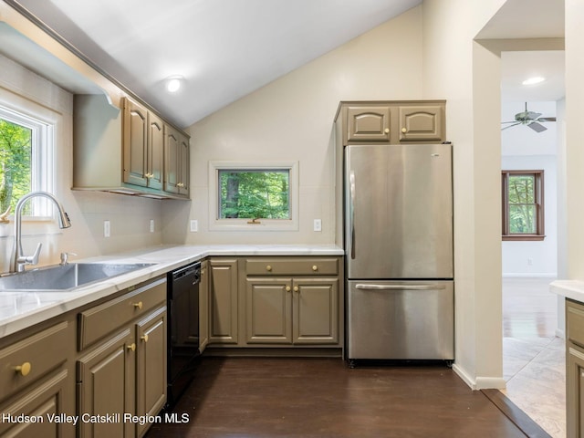 221 Cardinal Rd, Hyde Park, NY 12538 - kitchen featuring freestanding refrigerator, vaulted ceiling, dark wood-style flooring, and healthy amount of natural light