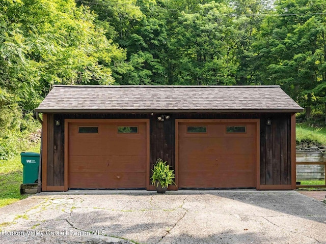 221 Cardinal Rd, Hyde Park, NY 12538 - detached garage with a wooded view