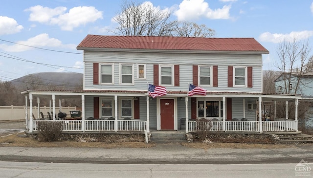 170 County Route 7a Unit 1, Copake, NY 12516 - view of front facade with covered porch and a metal roof