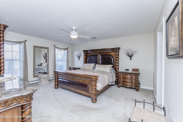 bedroom with a ceiling fan, visible vents, carpet floors, and baseboards