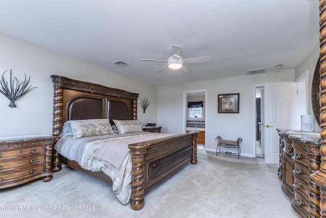 bedroom with visible vents, baseboards, connected bathroom, and a ceiling fan