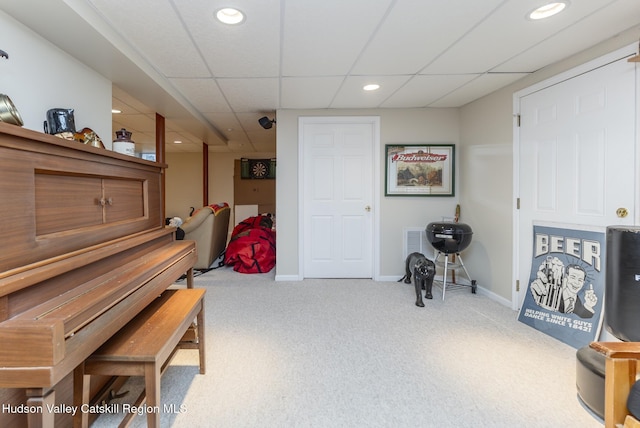 sitting room with recessed lighting, baseboards, carpet floors, and a paneled ceiling