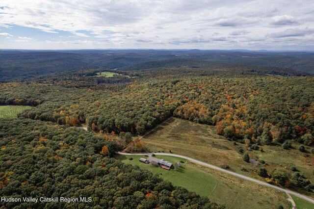 aerial view featuring a view of trees