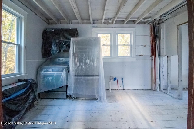 miscellaneous room with hardwood / wood-style floors and a wealth of natural light