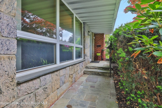 12 Roming Ln, Saugerties, NY 12477 - view of exterior entry with stone siding