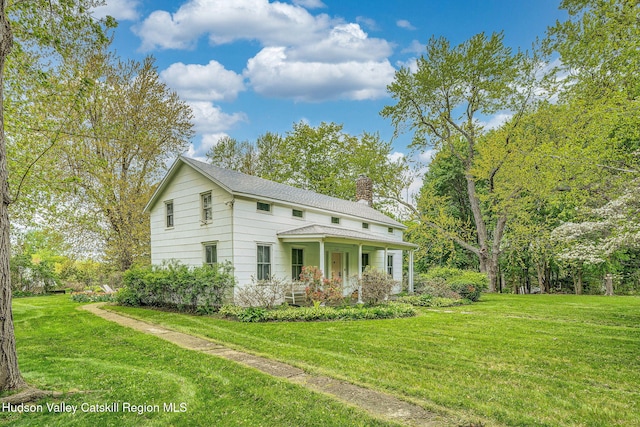 84 Old Rte 82, Hudson, NY 12534 - view of home's exterior featuring covered porch, a chimney, and a lawn