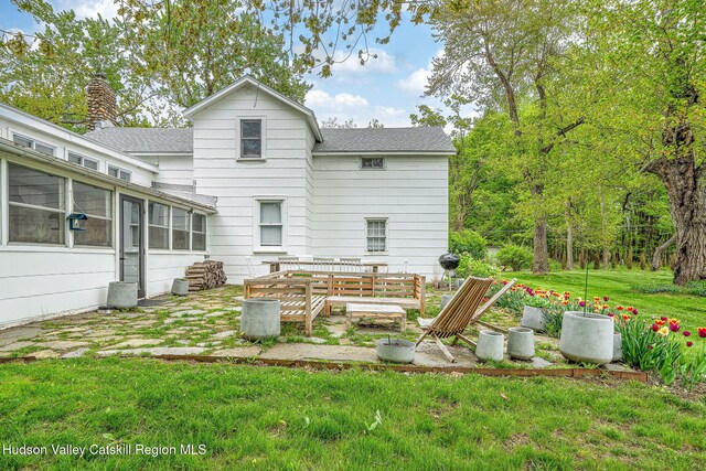 84 Old Rte 82, Hudson, NY 12534 - rear view of property with a shingled roof, a lawn, and a sunroom