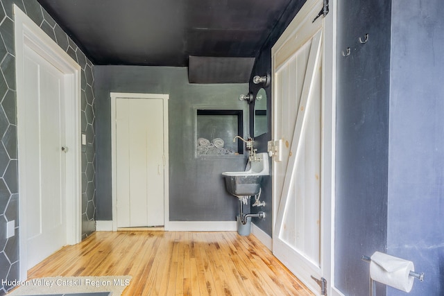 84 Old Rte 82, Hudson, NY 12534 - bathroom with wood-type flooring and baseboards