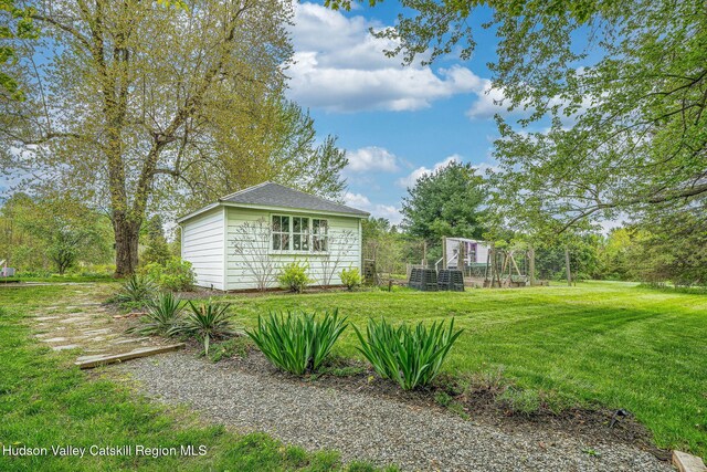 84 Old Rte 82, Hudson, NY 12534 - view of grassy yard with an outbuilding and a garden