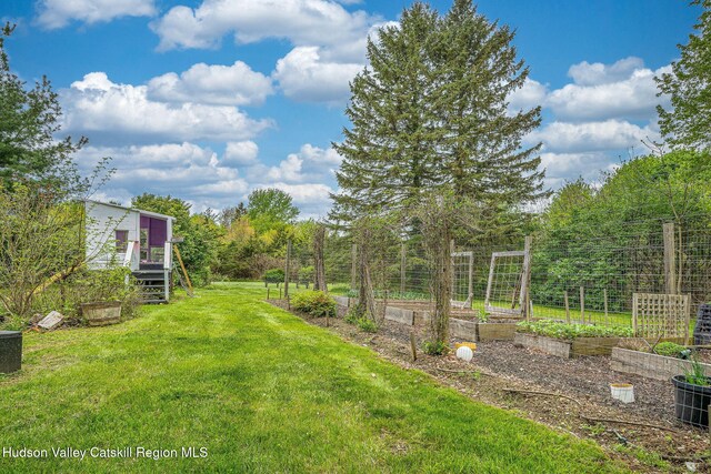 84 Old Rte 82, Hudson, NY 12534 - view of green lawn with a vegetable garden and central AC unit