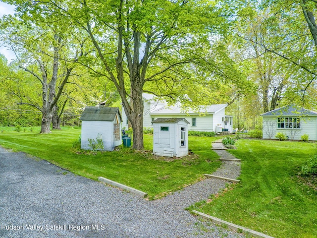 84 Old Rte 82, Hudson, NY 12534 - view of grassy yard with a storage shed and an outdoor structure