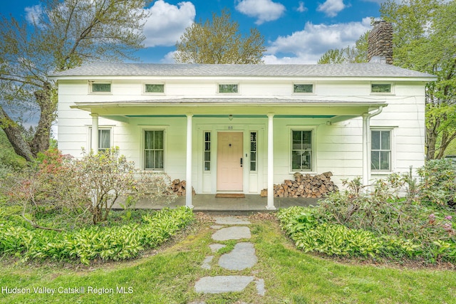 84 Old Rte 82, Hudson, NY 12534 - view of front of house with a chimney and a porch