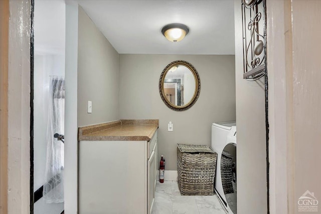 4916 Rte 81, Greenville, NY 12083 - laundry room featuring light marble finish floors, washer and dryer, and cabinet space