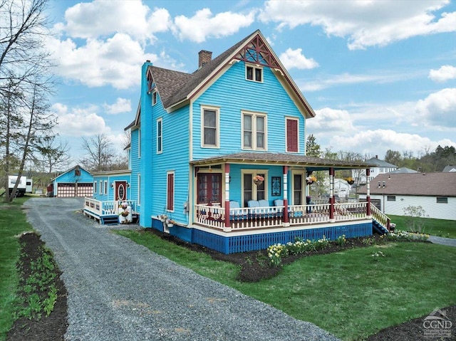 4916 Rte 81, Greenville, NY 12083 - view of front of property with a porch, a chimney, an outdoor structure, a detached garage, and a front yard
