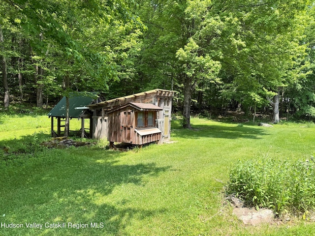 65 Bluebird Ln, Andes, NY 13731 - view of grassy yard featuring an outbuilding and exterior structure